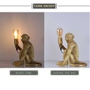 Rila" resin monkey table lamp