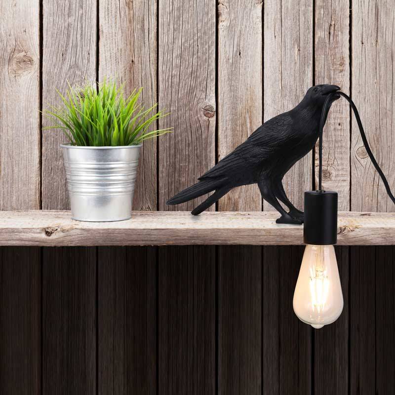 Raven table lamp in resin "Corb".