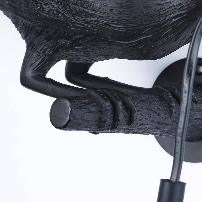 Raven wall lamp in resin "Corb".