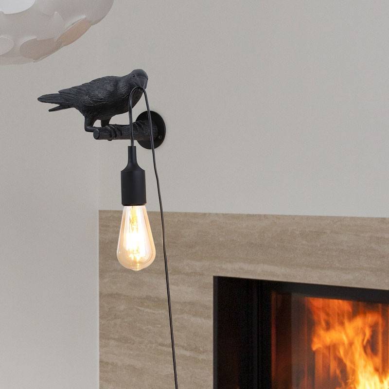 Raven wall lamp in resin "Corb".