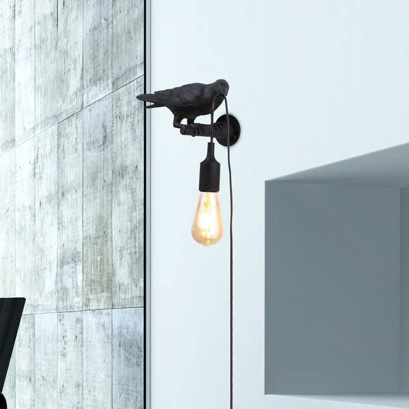 Raven wall lamp in resin "Corb".
