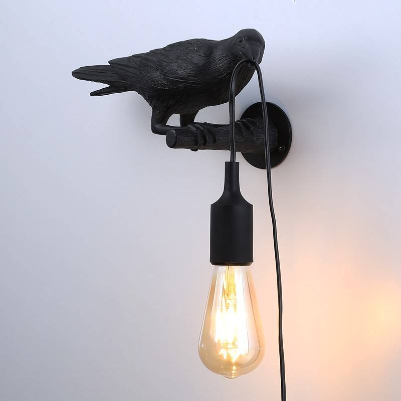 Raven wall lamp in resin "Corb".
