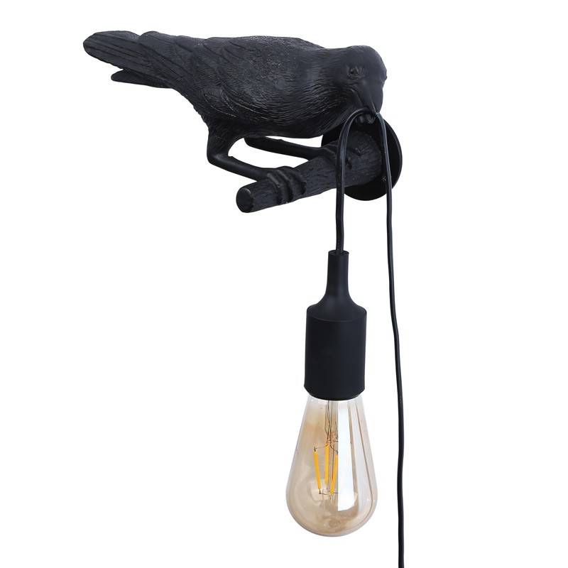 Raven wall lamp in resin "Corb".