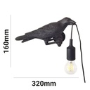 Raven wall lamp in resin "Corb".