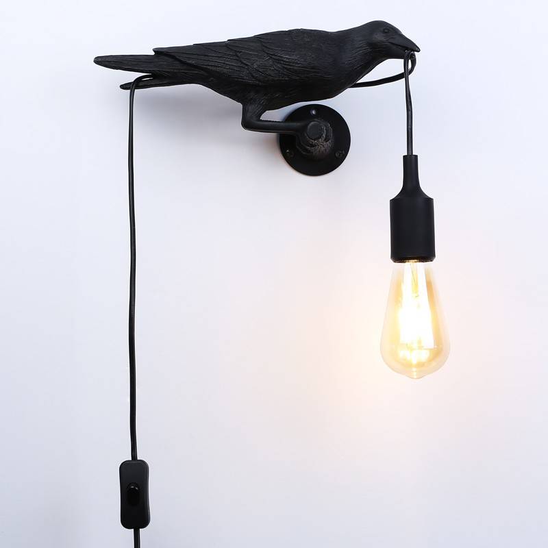 Raven wall lamp in resin "Corb".