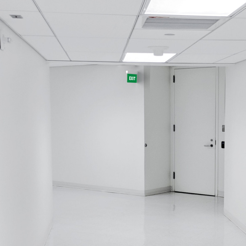 Permanent emergency light with "Exit" sign