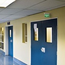 Permanent emergency light with "Emergency Exit" sign