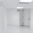 Luz de emergencia permanente con cartel "Salida"