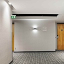 Permanent emergency light with "Side arrow" pictogram