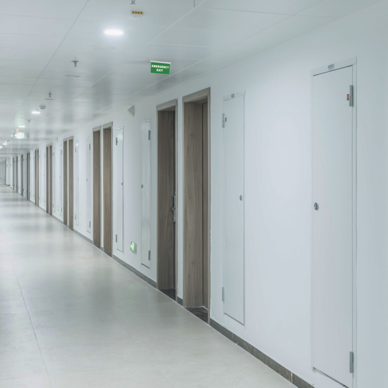 Recessed permanent emergency light with "EMERGENCY EXIT" sign